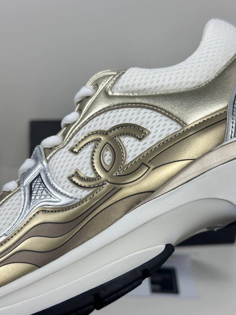 CC shiny trainers
