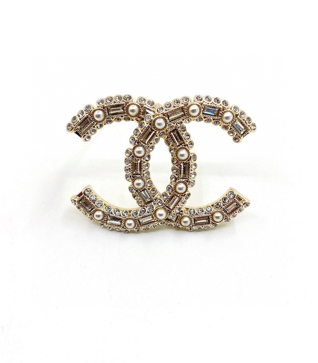 Gold CC brooche