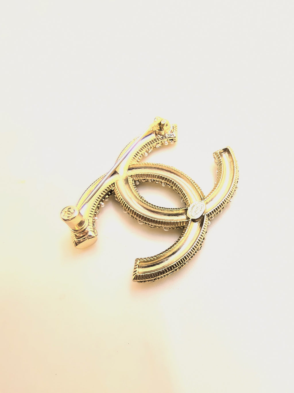 Gold CC pearl & diamond brooche