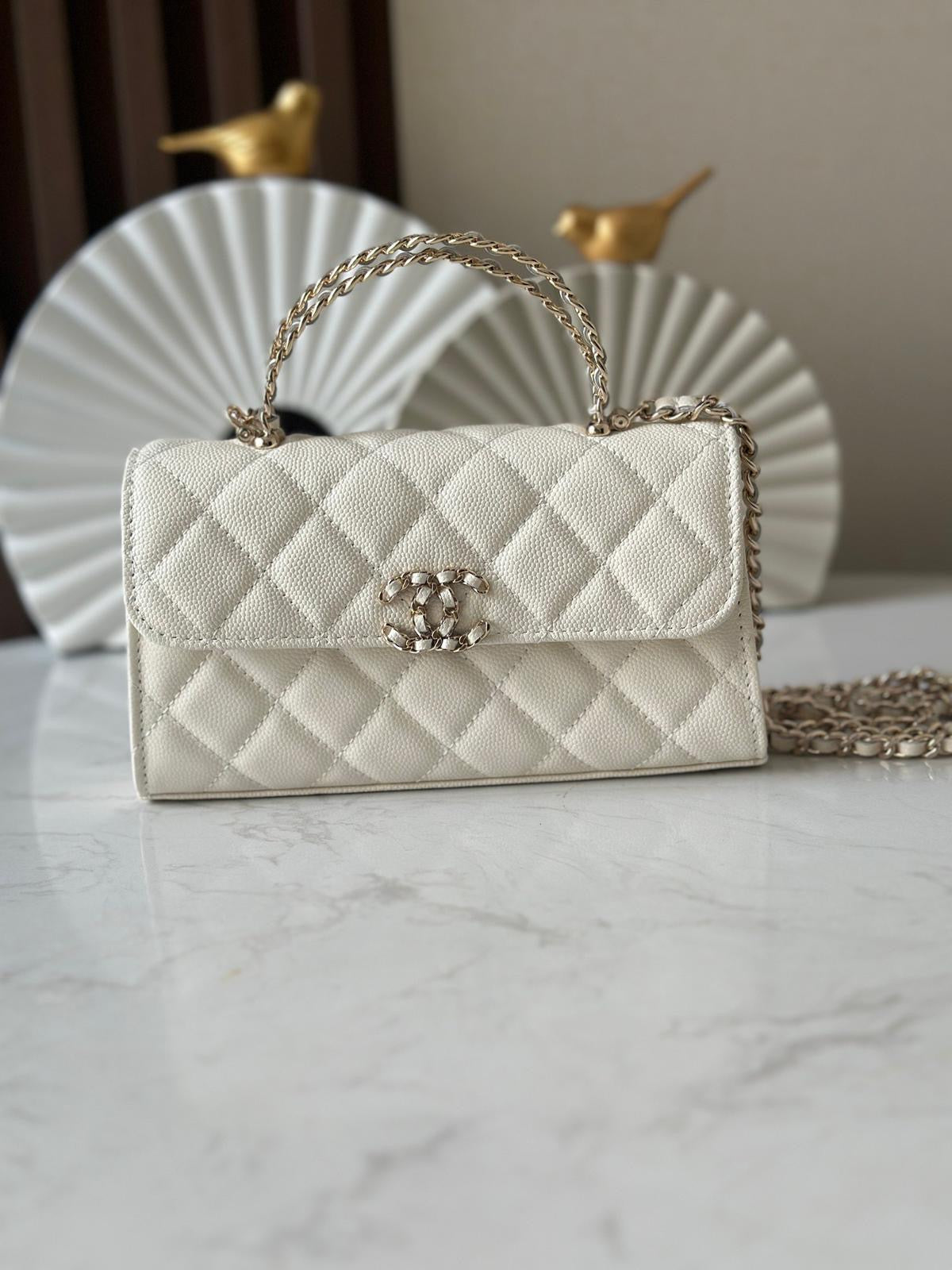 CC white handle flap bag