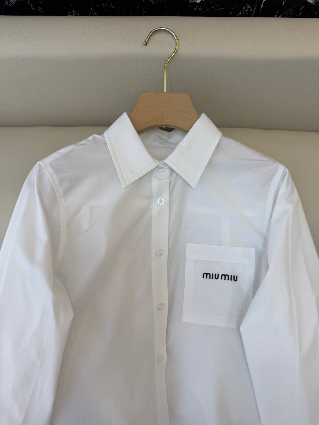 white miu shirt